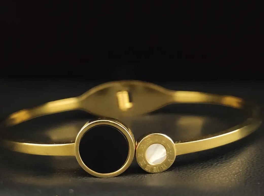 Eclipse Charm Bangle – Black & Gold Statement Piece