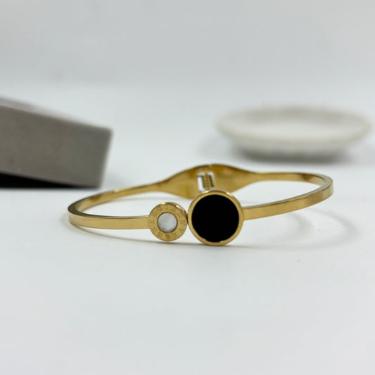 Eclipse Charm Bangle – Black & Gold Statement Piece